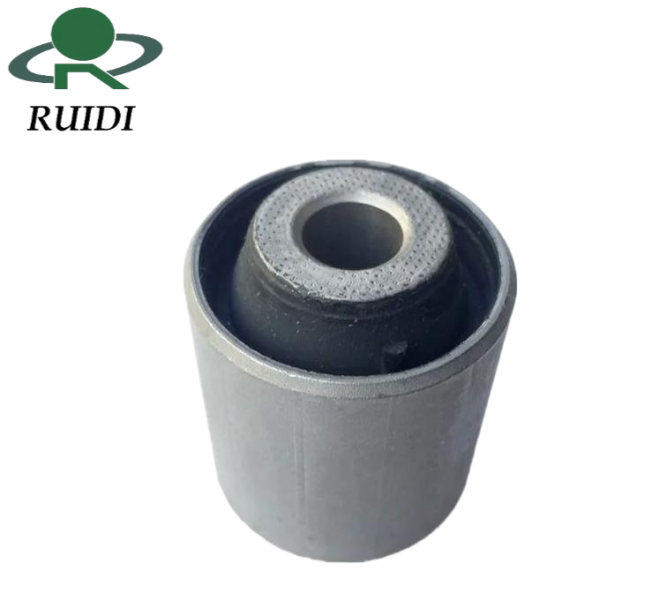 Bakaxel släparmsbussning